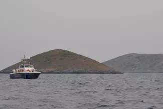 Un bateau des gardes-côtes grecs patrouillant dans la mer Egée (photo d'archive d'avril 2018)  Reuters (Samiaki TV)


