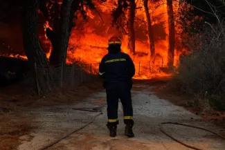 Au moins quatre habitations ont été détruites. © Manolis LAGOUTARIS / AFP


