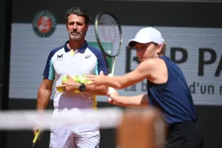 Patrick Mouratoglou ne lâche pas Simona Halep. (P. Lahalle/L'Équipe)


