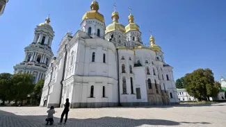 La cathédrale Ouspenski à Kiev. Le Parlement ukrainien a voté l'interdiction de la branche de l'Eglise orthodoxe affiliée à la Russie. (Sergei SUPINSKY/AFP)