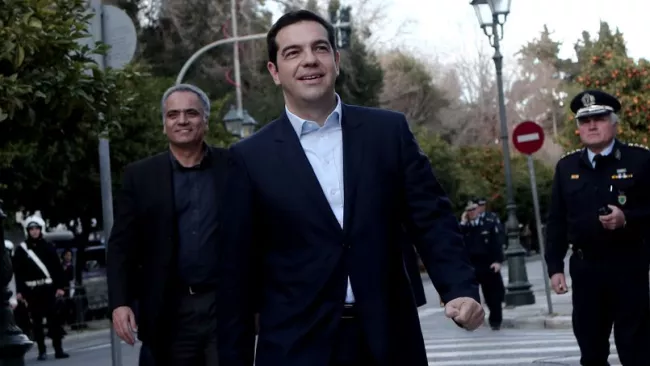 «Je servirai toujours la Grèce et l'intérêt du peuple grec», a déclaré Alexis Tsipras lors d'une prestation de serment. Crédits photo : ANGELOS TZORTZINIS/AFP


